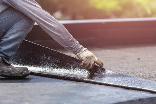 Professional Basement Waterproofing technician working in Calhoun, TN